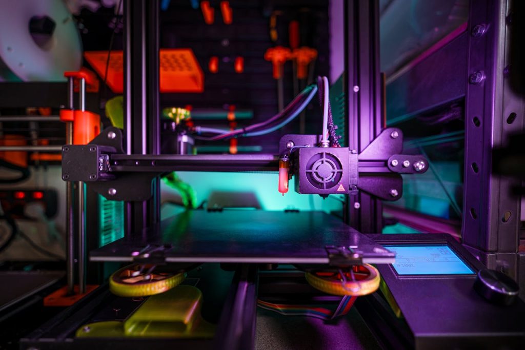 Close-up shot of a modern 3D printer in a laboratory setting, showcasing innovation and technology.